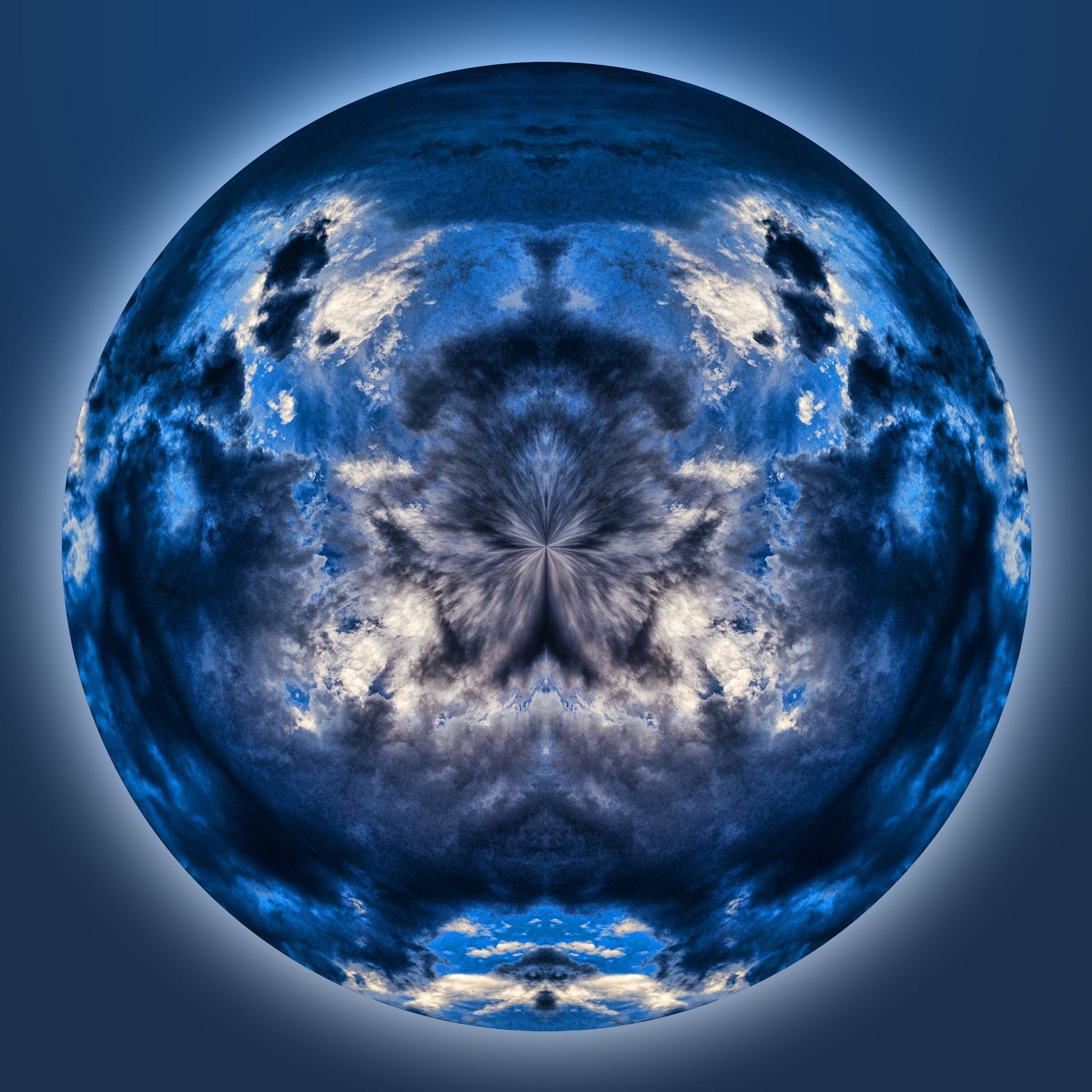 A western sky late in the day, copied and mirrored horizontally, then wrapped with Polar Coordinates in Photoshop. 9 August 2016